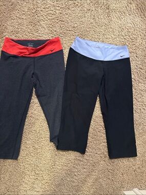 Nike Women’s Black Capri Leggings with Red and Light Blue Waistbands